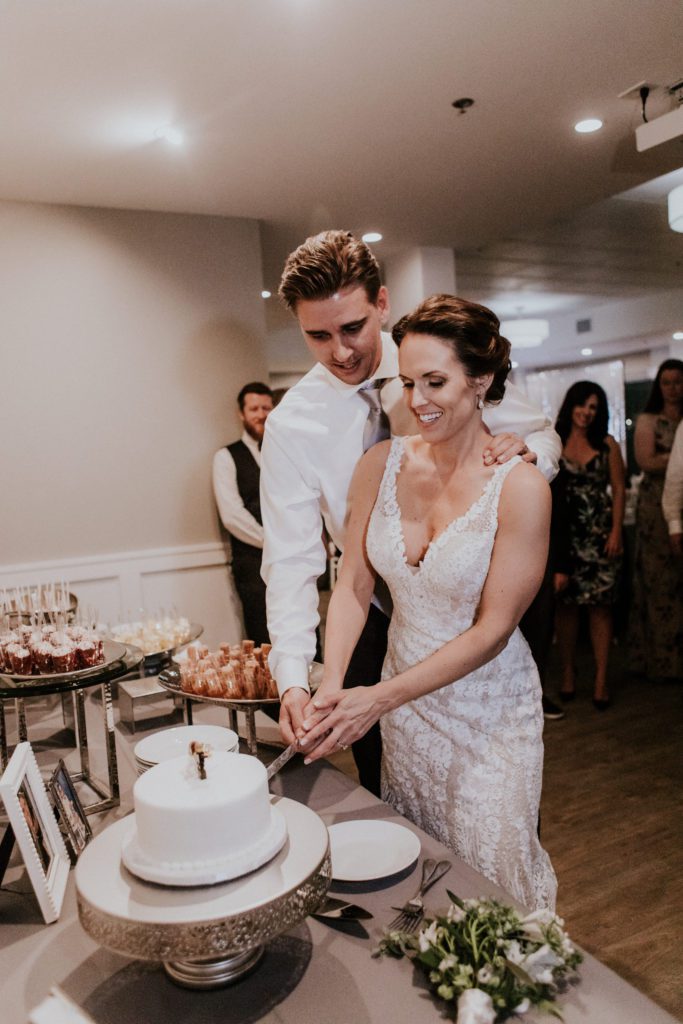 Lauren Ross Wedding cake ceremony pic